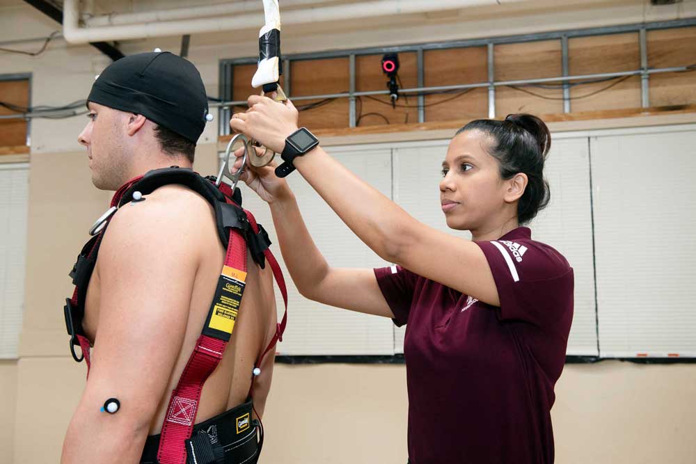 Student running tests on patient