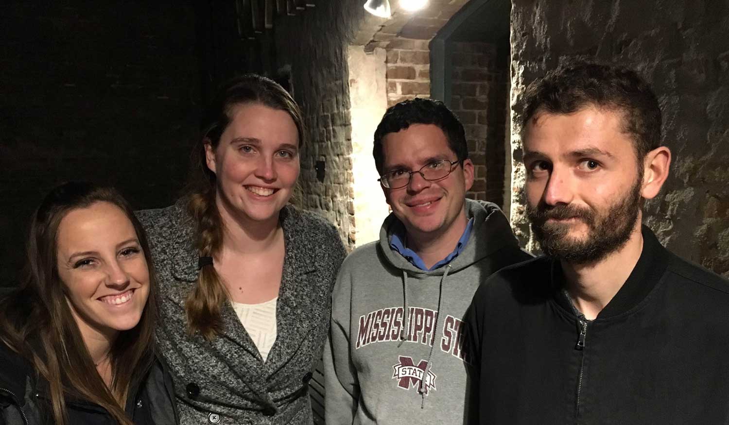 image of PHD students smiling for camera